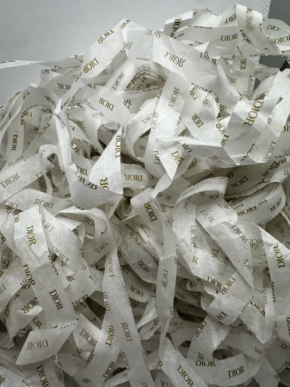 Dior White Gift Box with Gold Logo and protective wrapping inside